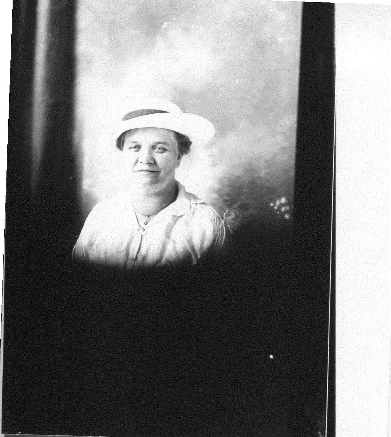 photo of Portrait of Unidentified Woman in a White Dress