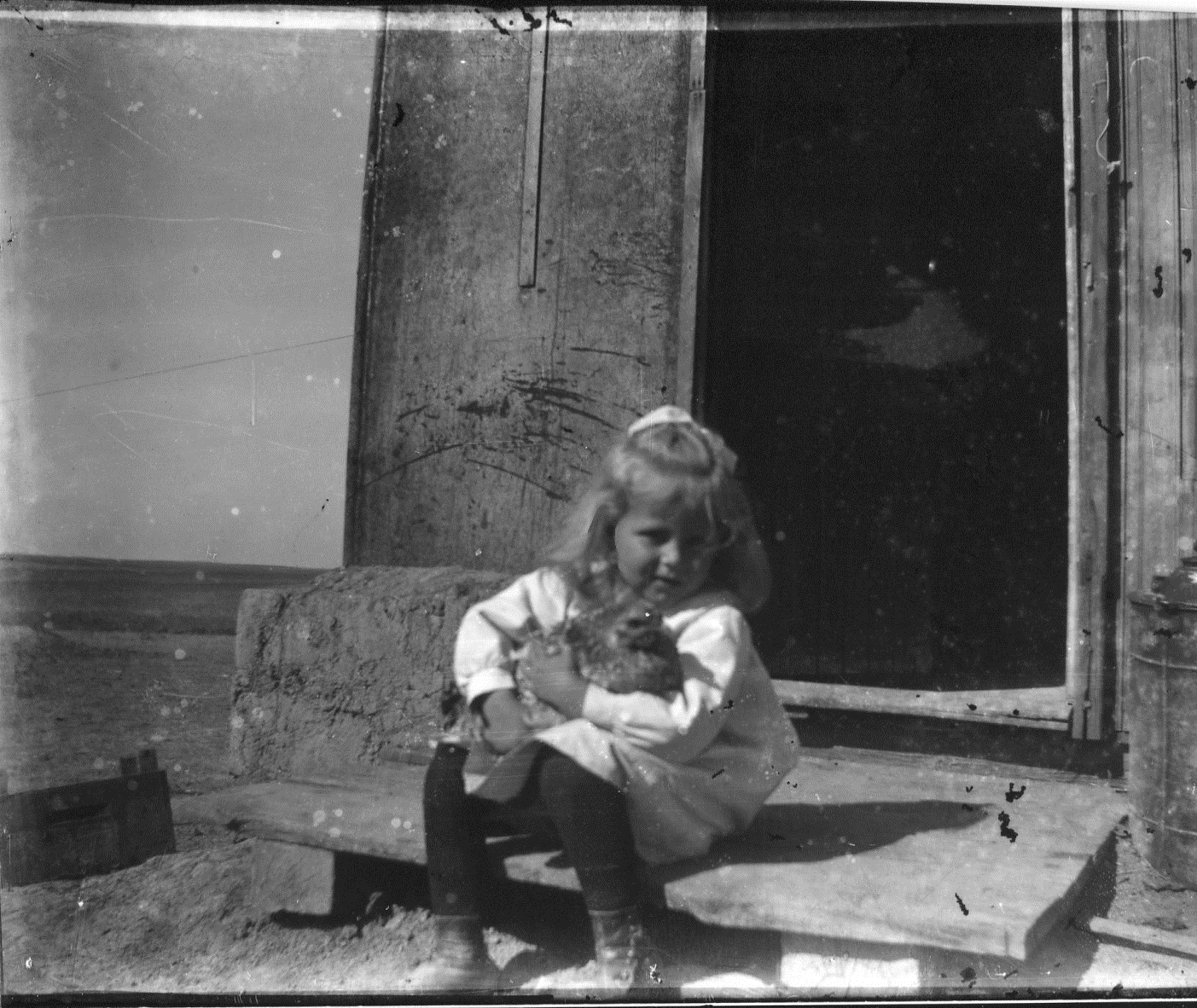 photo of Unidentified Girl Holds Chicken