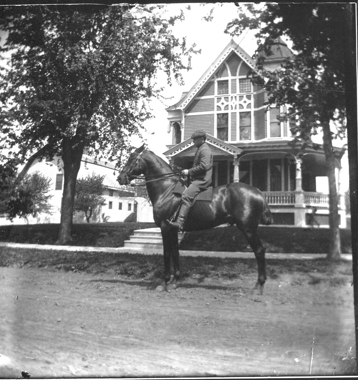 photo of Man Riding Horse