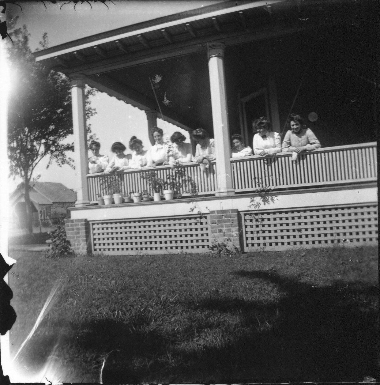 photo of Nine Unidentified Women on a Porch
