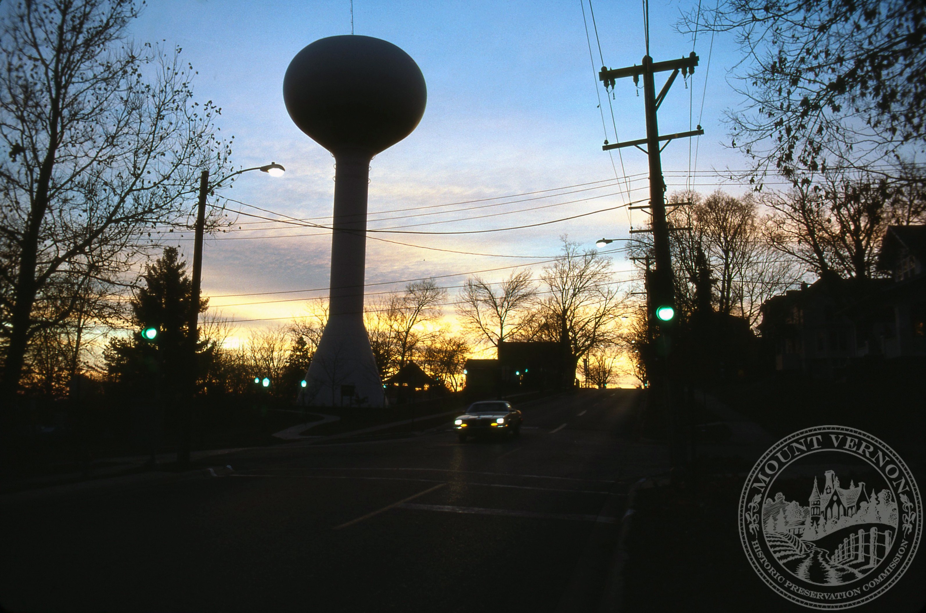 Photo of Sunset Behind Water Tower