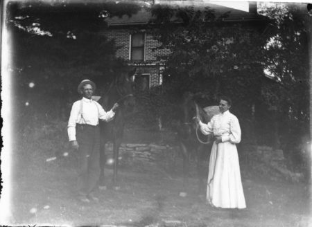 photo of Unidentified Couple Riding Horses