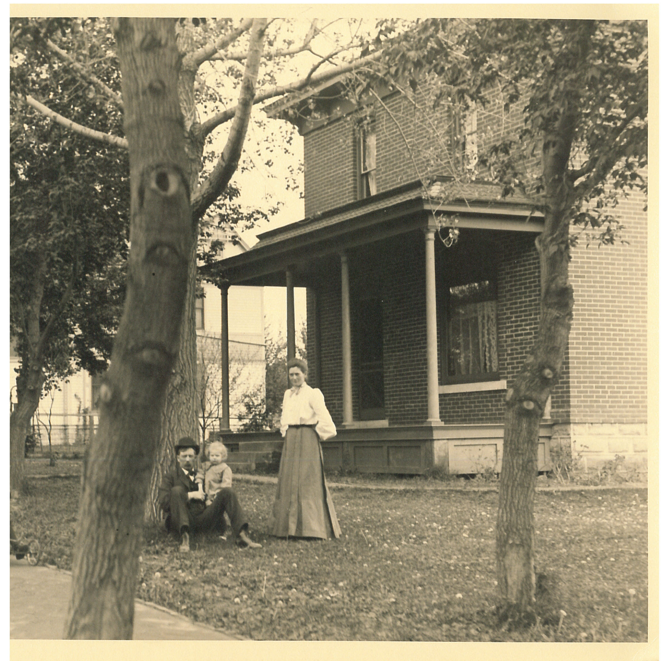 photo of Unidentified Family in Front of a House