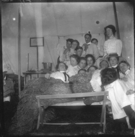 photo of Unidentified Men and Women Posing for a Photo