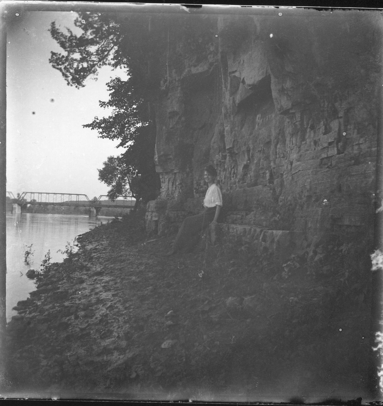photo of Unidentified Woman by a Cliff on the Cedar River