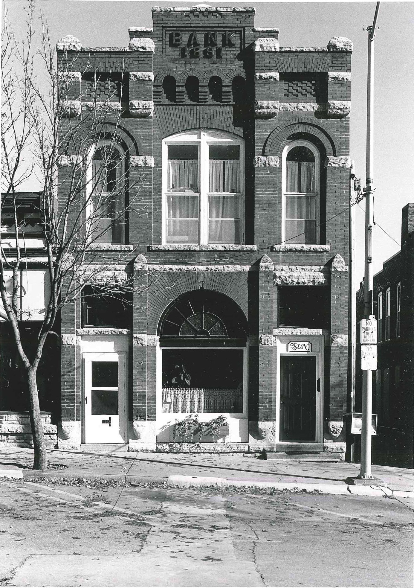 Photo of building at 113 First Street W. Photographed 1990 by Barbara Beving Long.