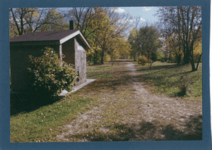 Old railroad house in a park in mid-fall