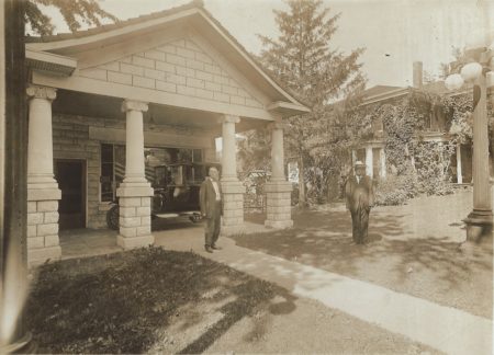 Photo of Drs. Tom and John Wolfe in front of their office.