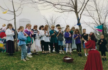 Photo of elementary students playing recorders in Memorial Park