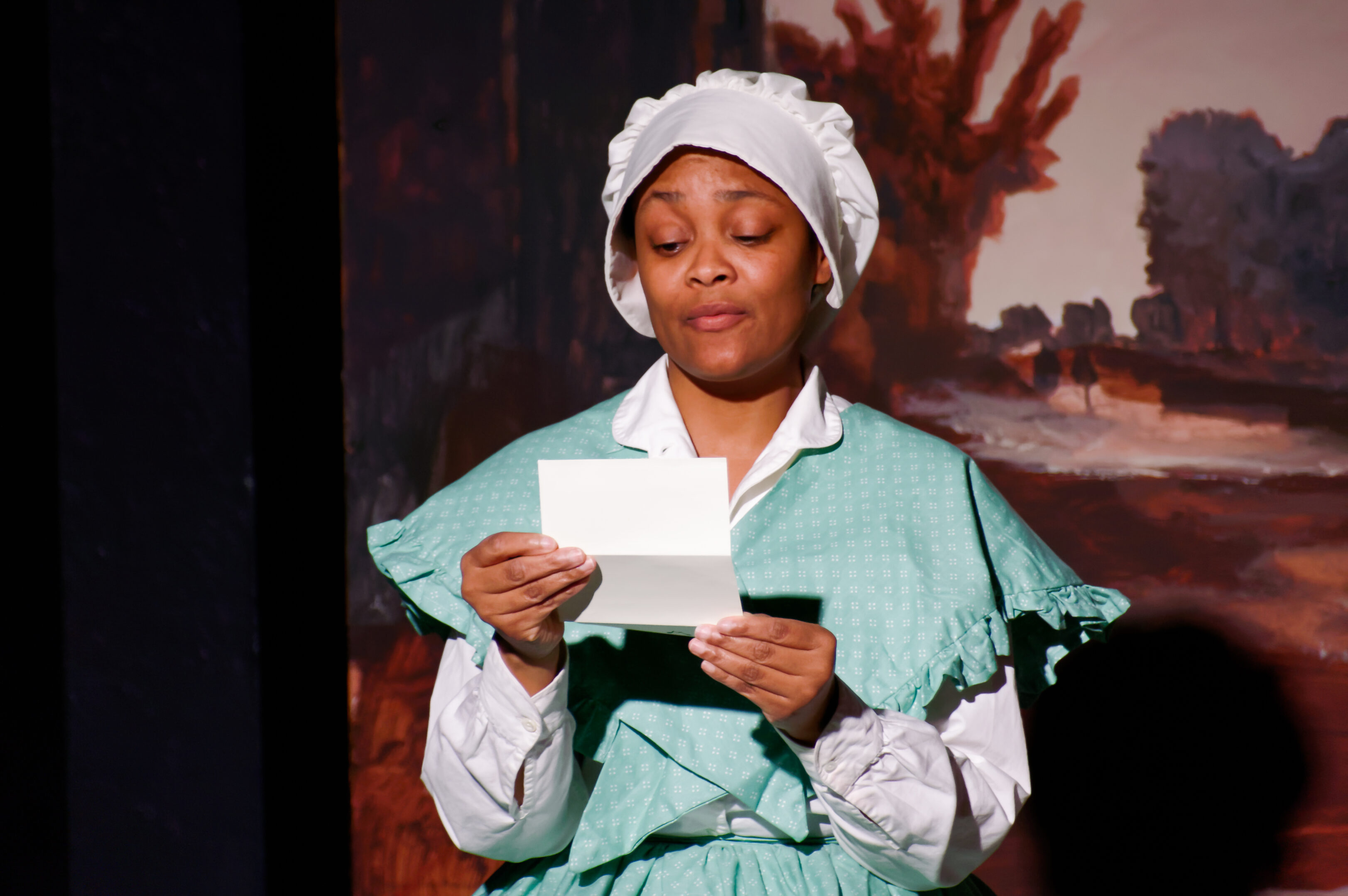 2023-Treasure Play-Tiyah Western reads letters home of from early settler Mrs. Benjamin Ford