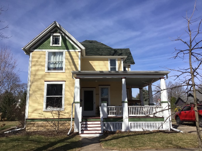 Two story home with large wrap around porch