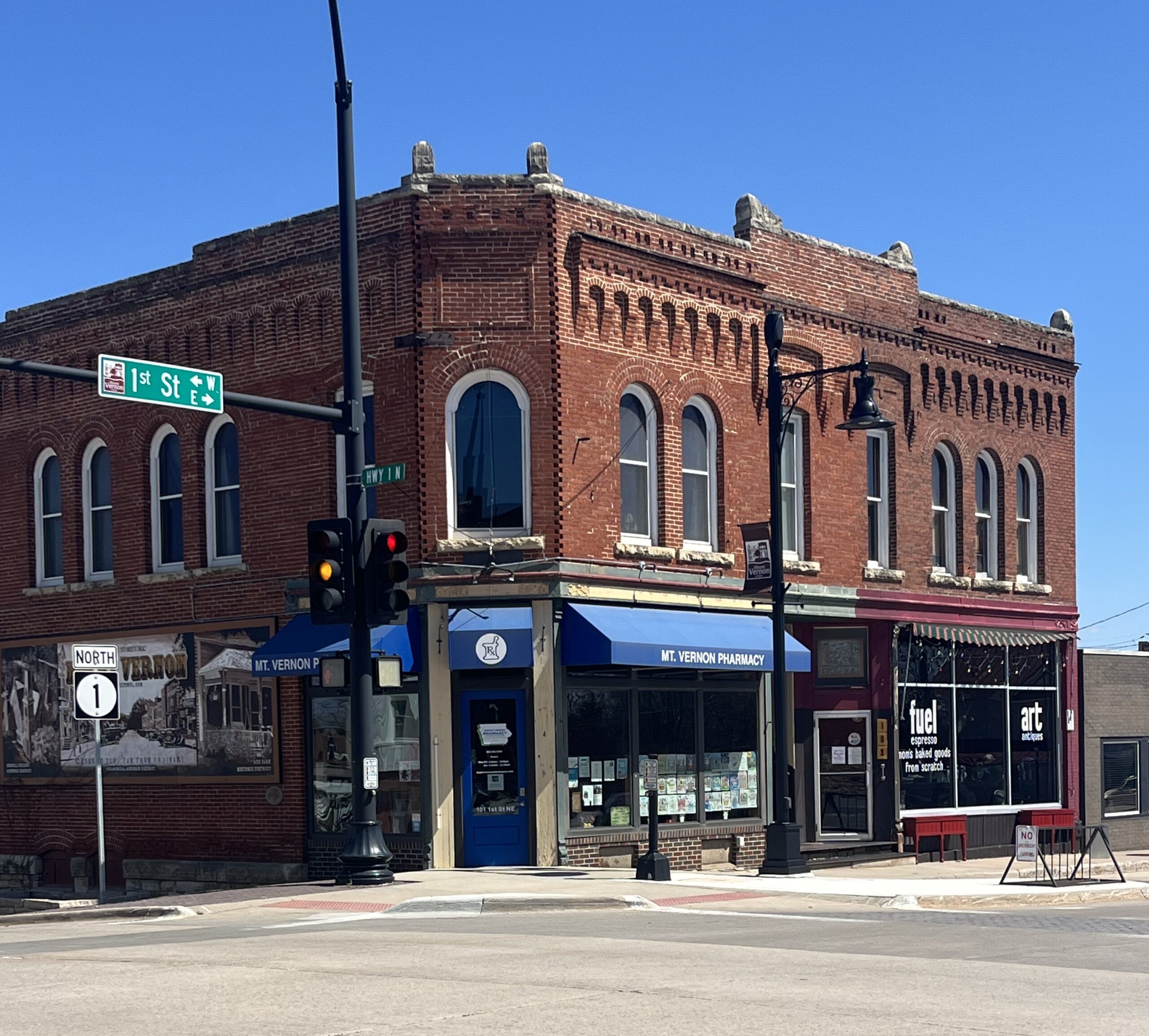 Photo of a brick building housing Mount Vernon Pharmacy.