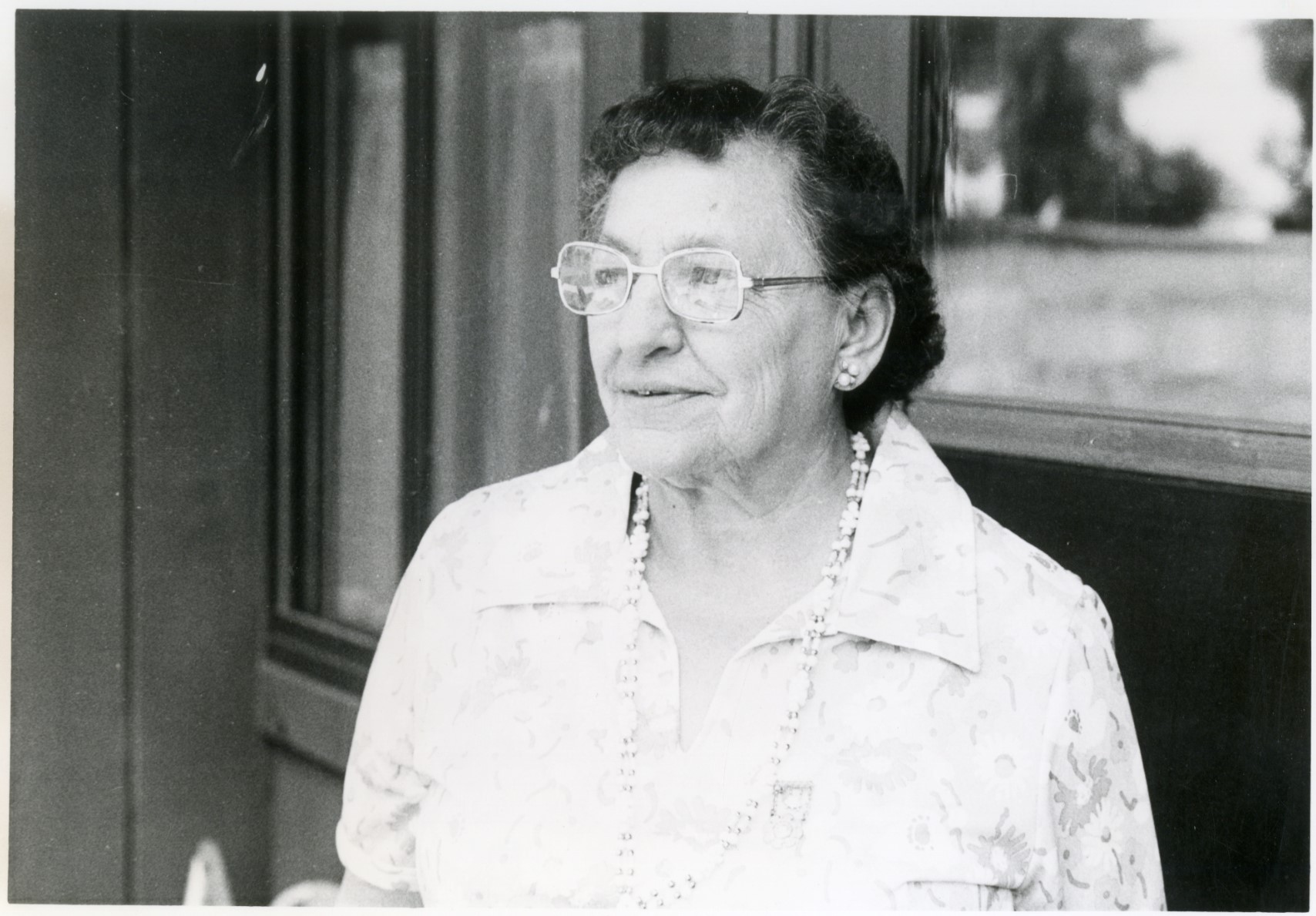Black and white photo of Mrs. Everett Shoemaker looking off into the distance.