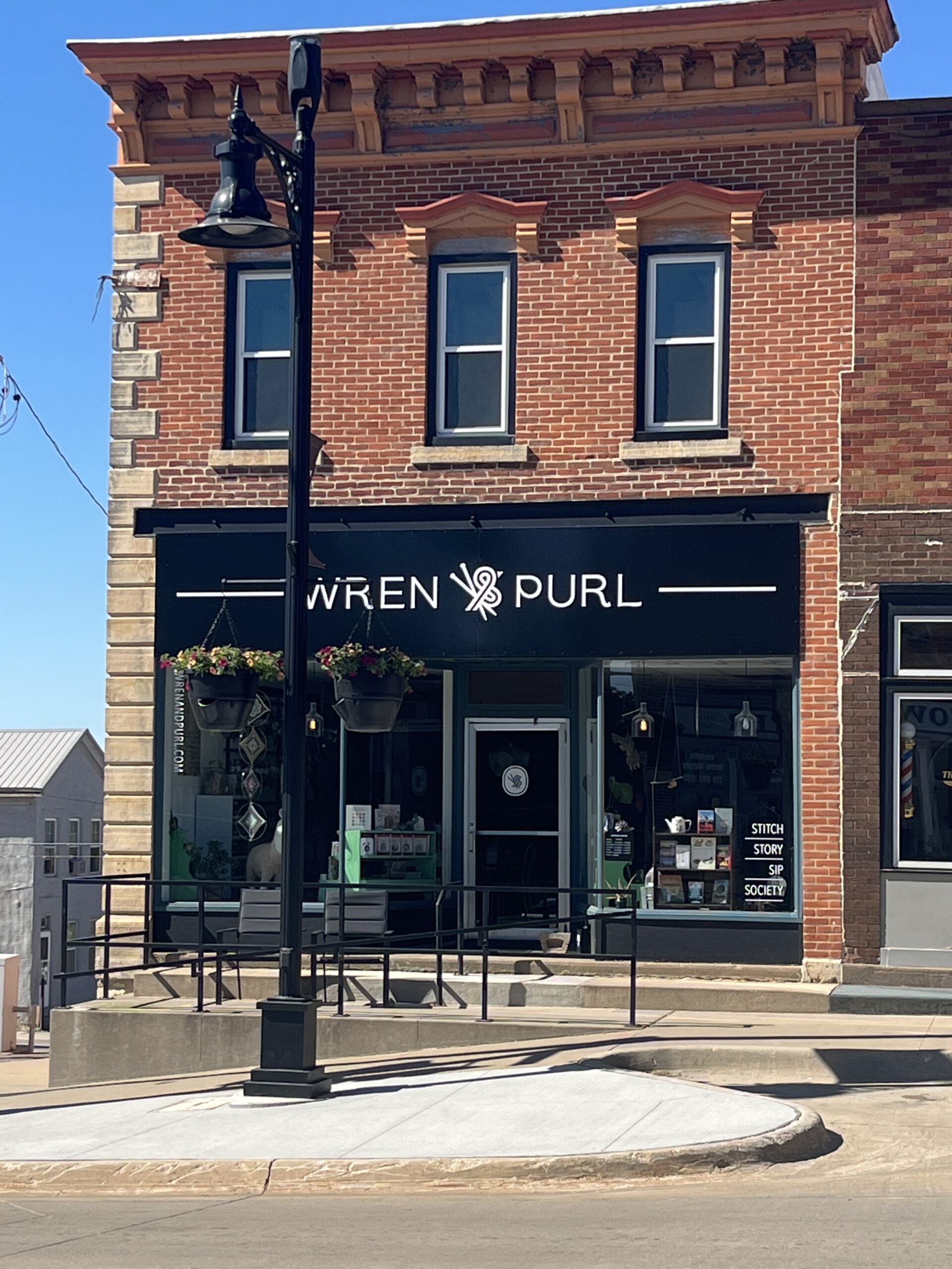 Wren & Purl is a brick building located at 100 First Street West.