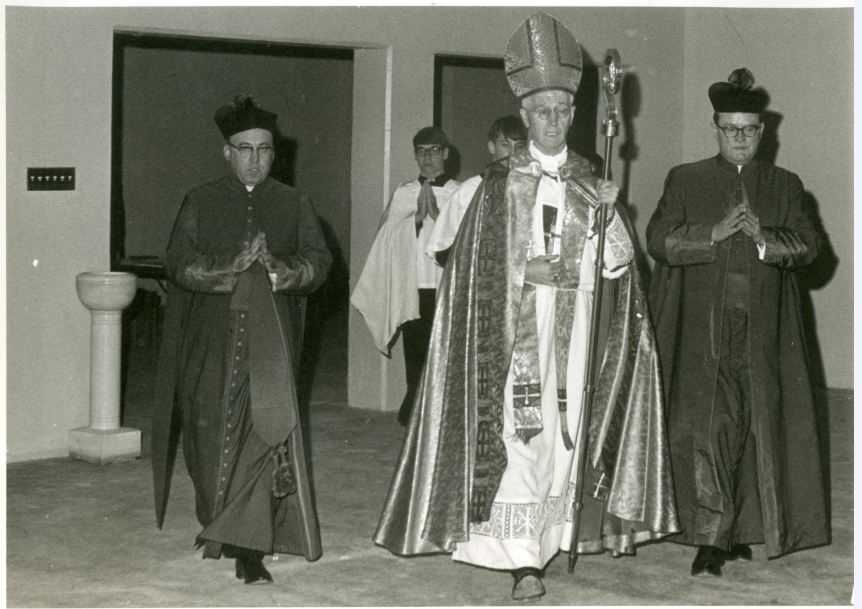 Black and white photo of Archbishop Byrne at the dedication of the new St. John's Catholic Church basement.